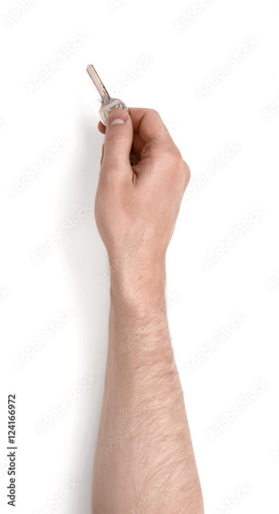 Man hand holding key, on a white background Man hand holding key, on a white background