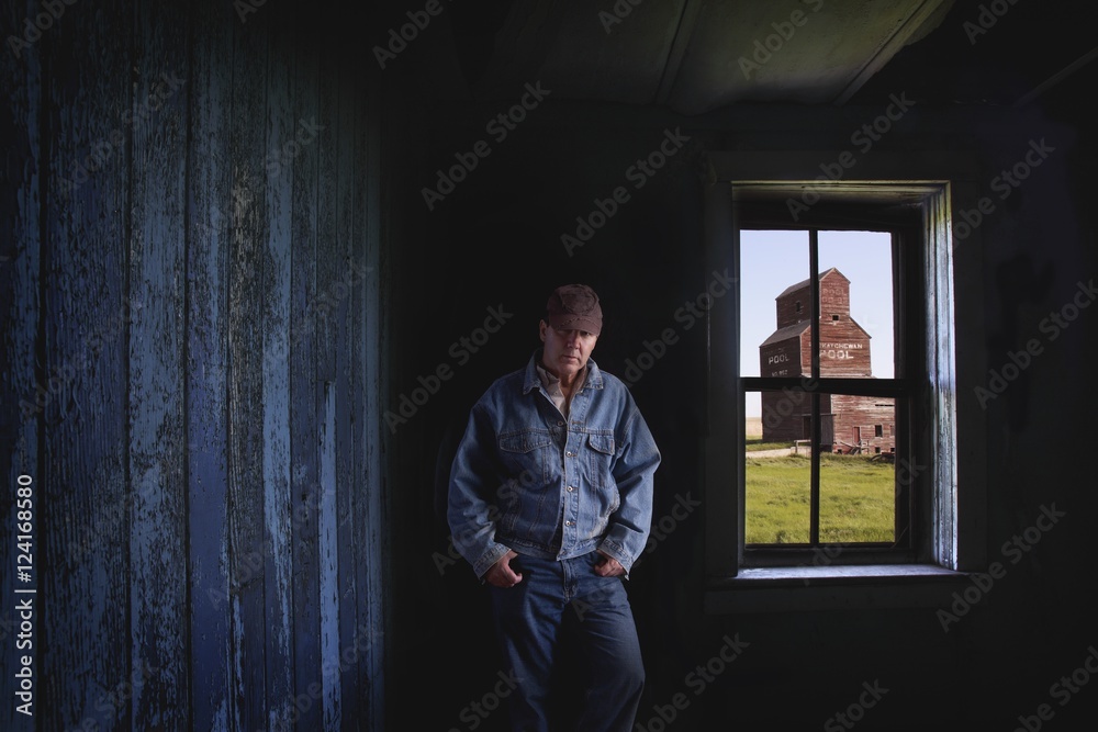 Portrait of farmer in ghost town, Bents, Saskatchewan, Canada Portrait of farmer in ghost town, Bents, Saskatchewan, Canada