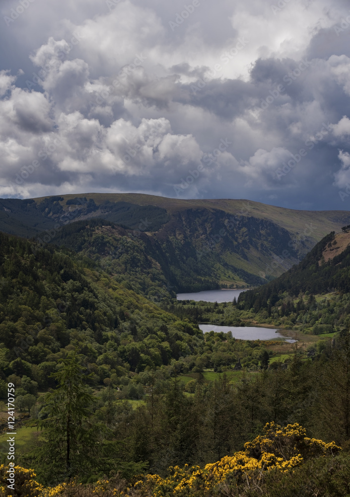 Naklejka premium High viewpoint over Glendalough lakes and ancient monastery