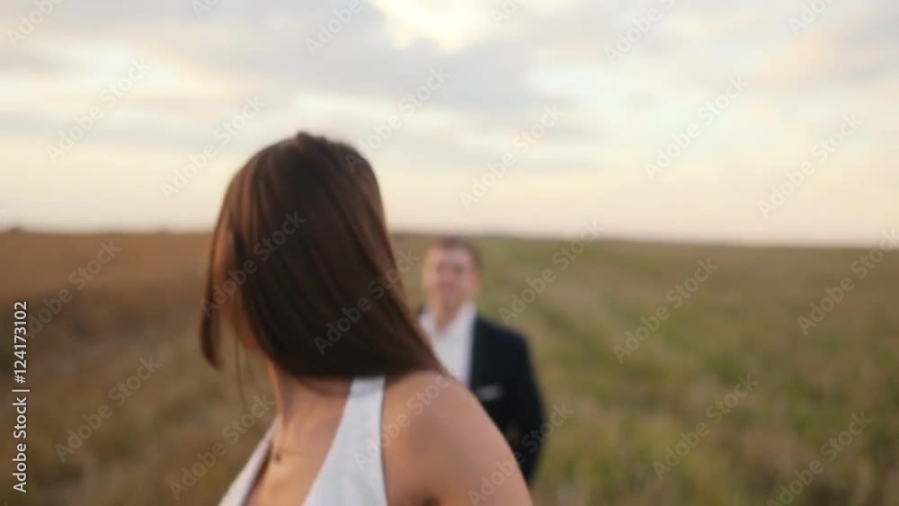 Bride and groom are jumping at the wheat field Bride and groom are jumping at the wheat field