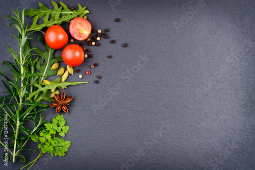Fresh herbs and dried spices background