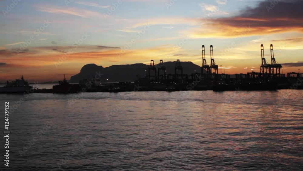 Harbor sunset in Morocco with mountains in background. Harbor sunset in Morocco with mountains in background.