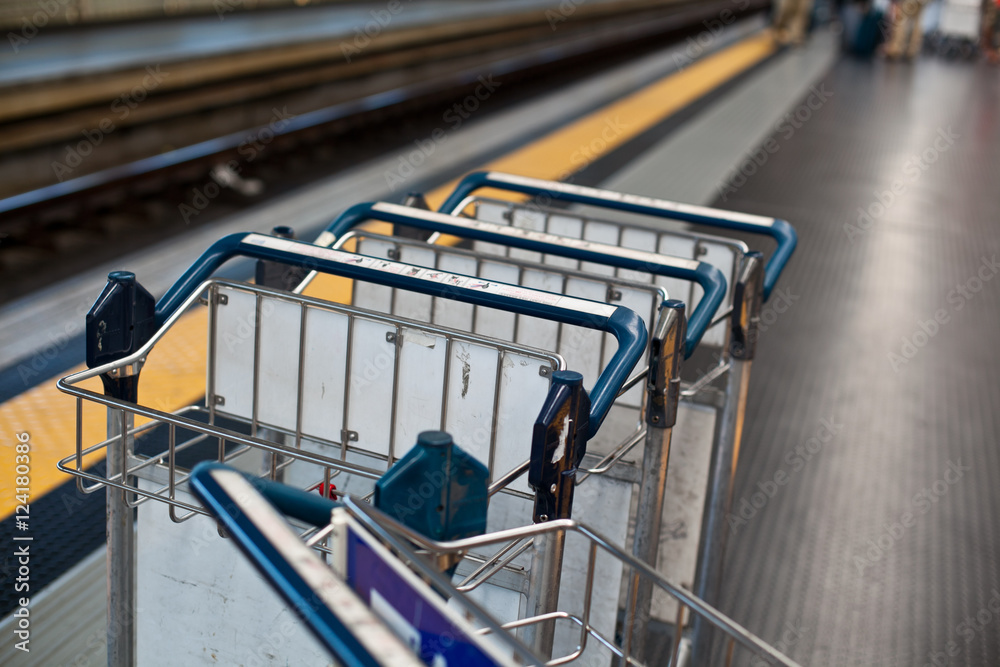 Luggage trolleys in railway station Luggage trolleys in railway station