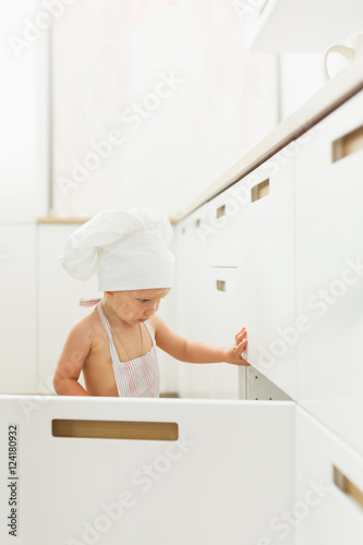 Baby in the cook costume