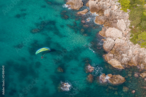 aerial view of the paraglider over the coast line © mariusz szczygieł