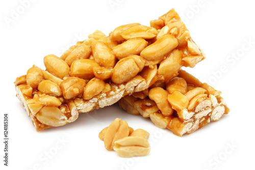 Tableau sur toile Bars with peanuts close-up.