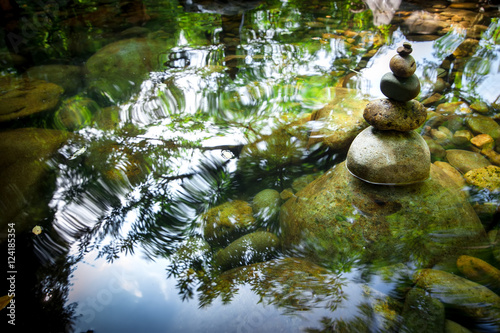 Canvas Print Amazing tropical rain forest landscape with lake and balancing rocks tower for zen meditation practice