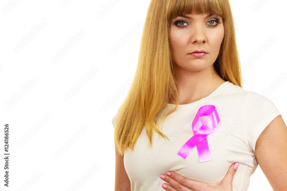 Woman sad girl wih pink cancer ribbon on chest