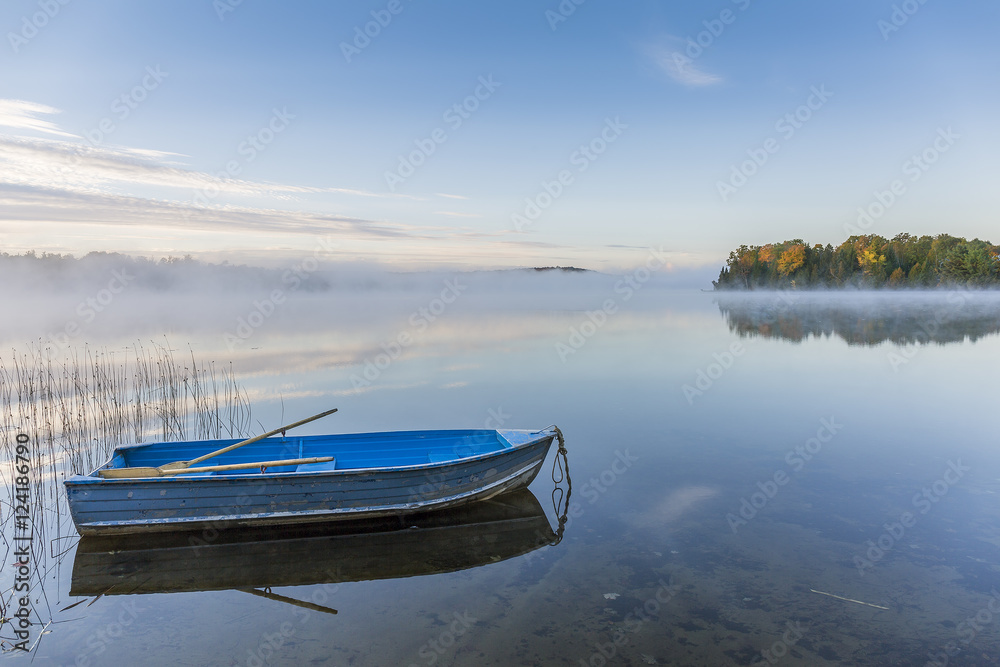 Rowboat on a Misty Lake in Autumn - Ontario, Canada