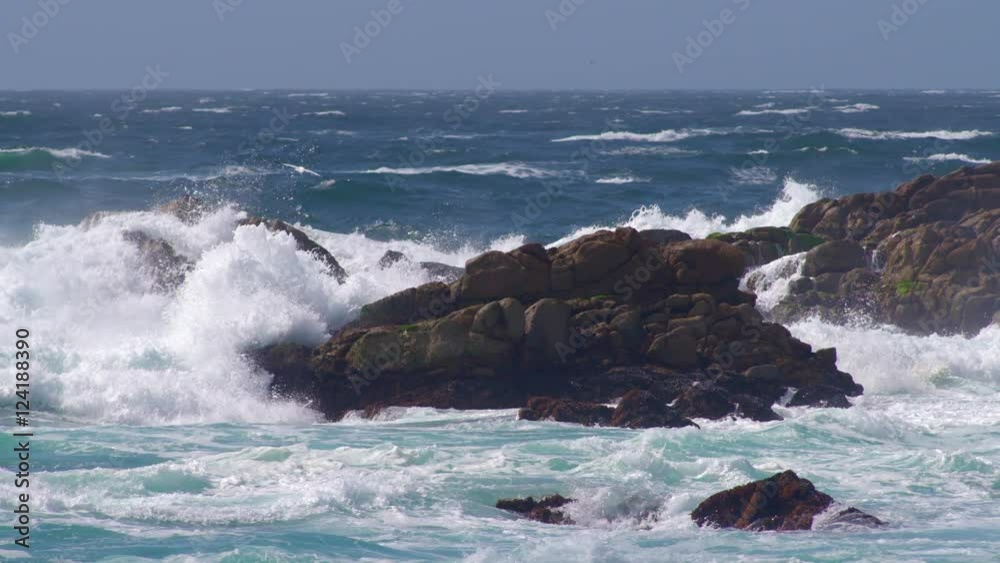 Slow motion of waves crashing on rocky coastline Slow motion of waves crashing on rocky coastline