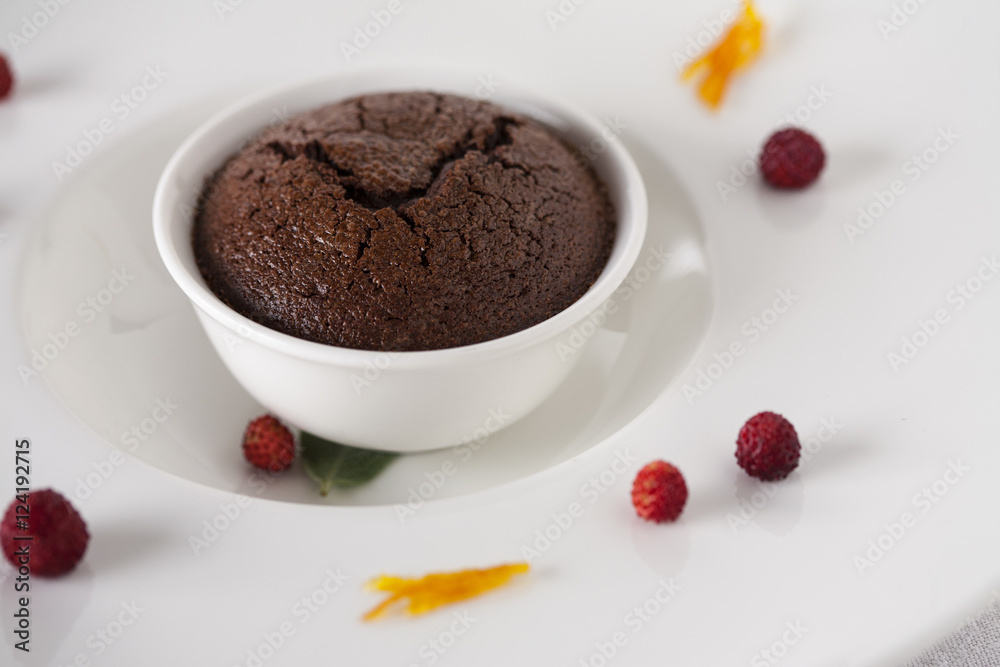 Delicious chocolate muffin arranged with fruits Delicious chocolate muffin arranged with fruits