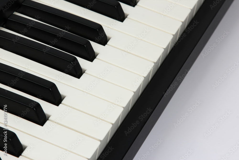 the piano keys closeup on white background