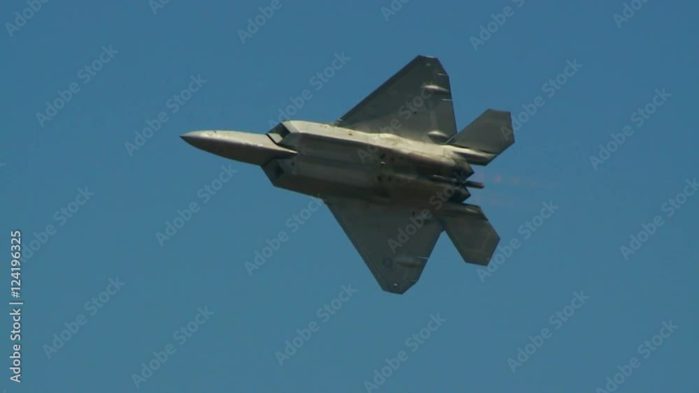 Slow motion of F22 fighter jet flying in sky Slow motion of F22 fighter jet flying in sky