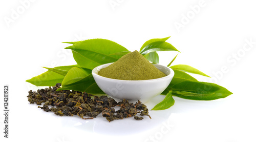 powder green tea and green tea leaf on white