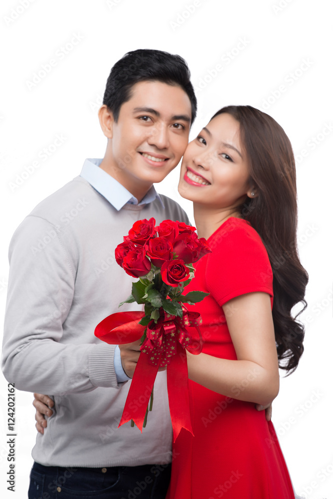 romantic moment: young man giving a rose to his girlfriend. Embr romantic moment: young man giving a rose to his girlfriend. Embr
