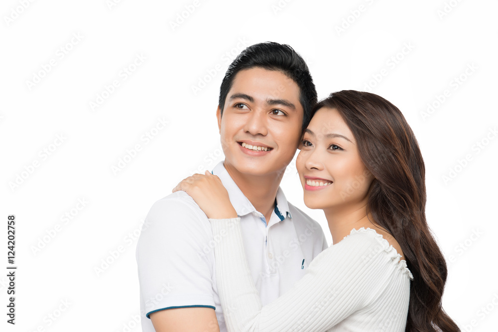 Happy asian couple isolated on white background. Cheerful young Happy asian couple isolated on white background. Cheerful young