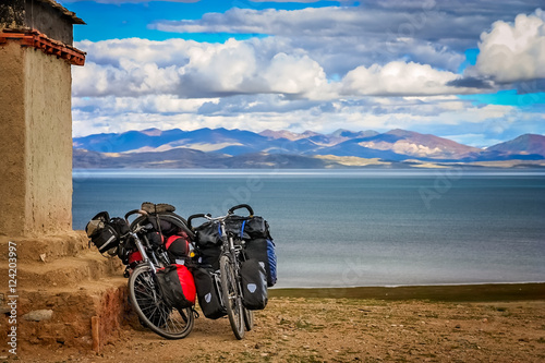 Photography Two cycle touring loaded bicycles on the shore of Lake Manasarov