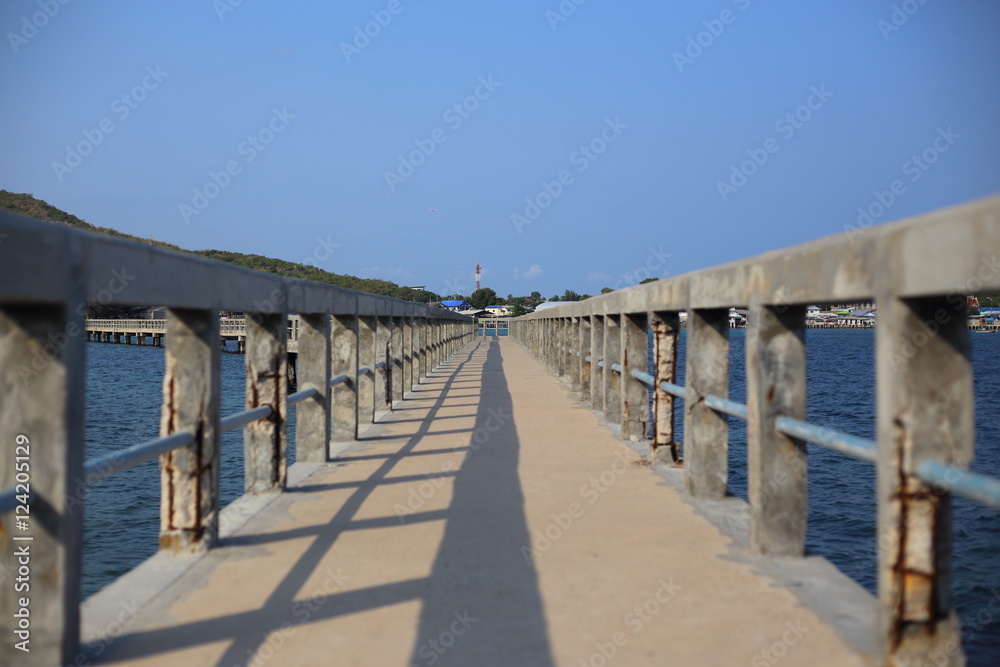 Cement bridge pier and wave in Mae Rumphueng Beach Rayong at Thailand