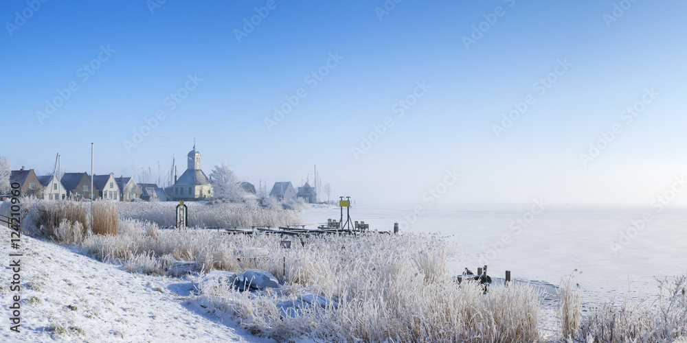 The village of Durgerdam, Netherlands in a frozen landscape