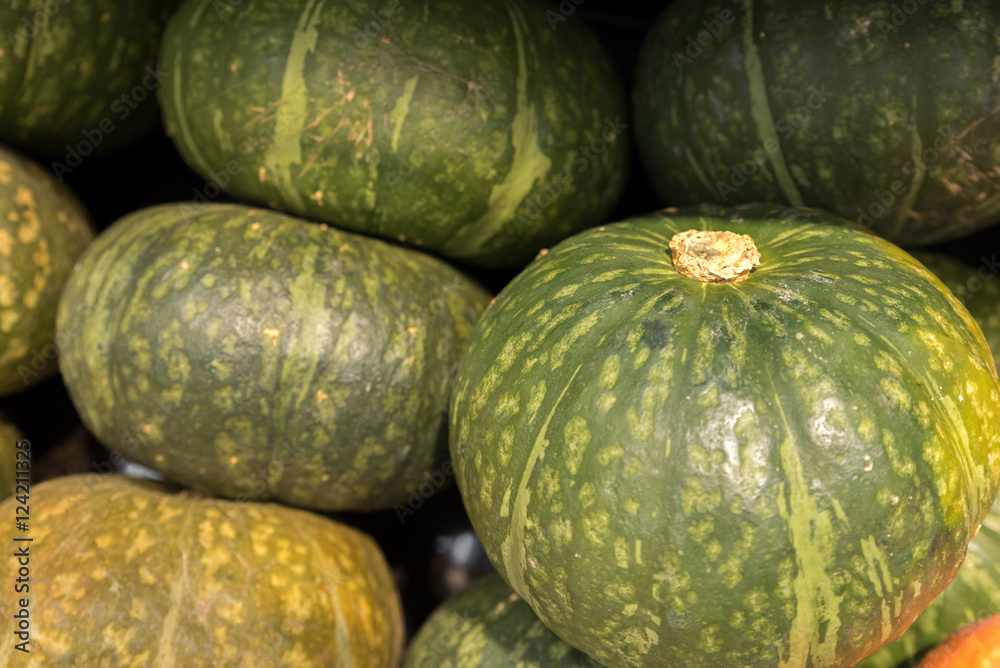 Pumpkins at fruit section in a supermarket Pumpkins at fruit section in a supermarket