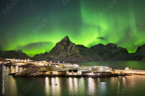 Aurora borealis over a village on the Lofoten in Norway