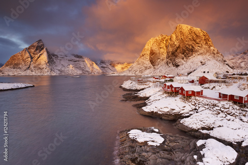 Spectacular light over Reine village on the Lofoten, Norway photo