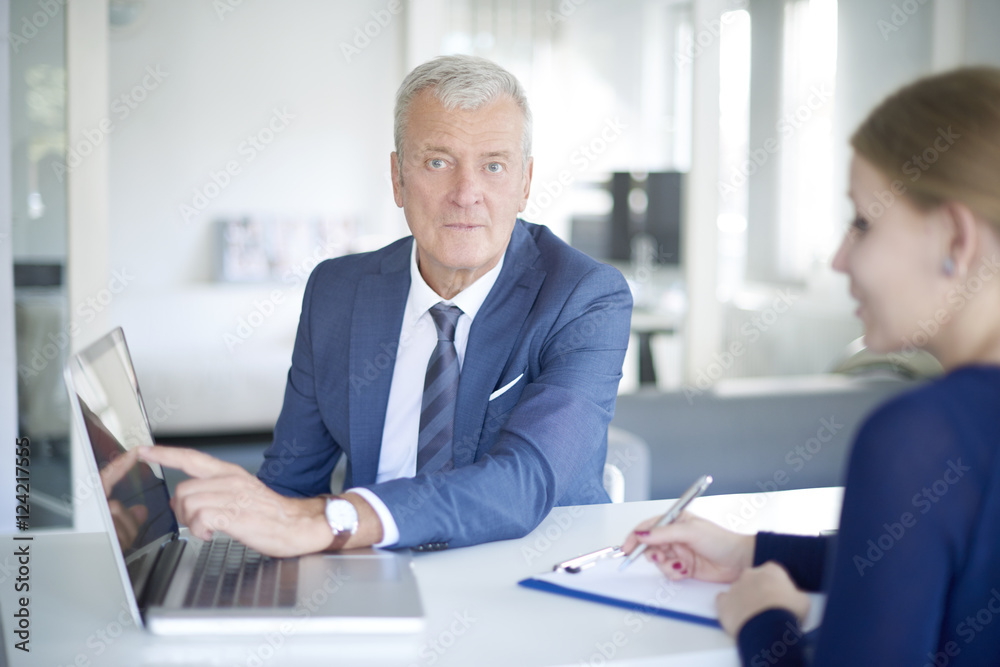 Senior bank advisor at work Senior bank advisor at work