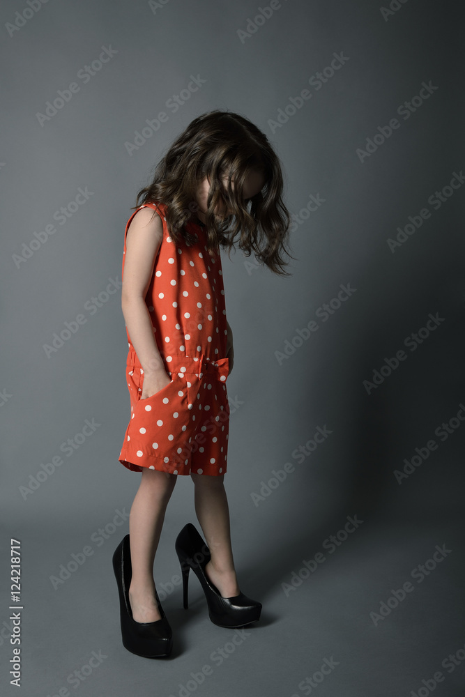 Little fashionista. Little beautiful fashion girl posing in moth Little fashionista. Little beautiful fashion girl posing in moth