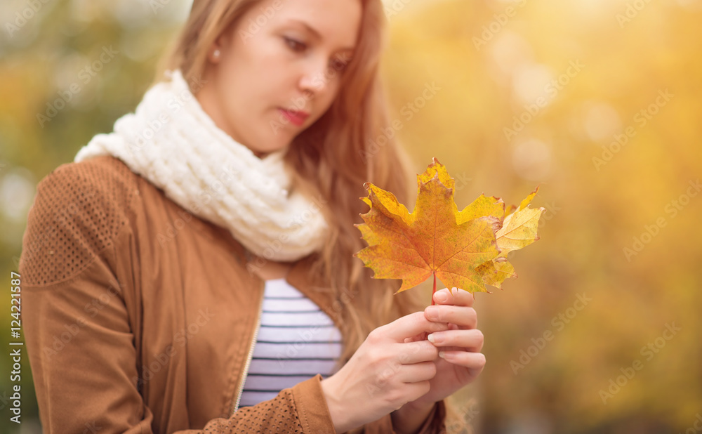Woman hands holding autumn leaves Woman hands holding autumn leaves