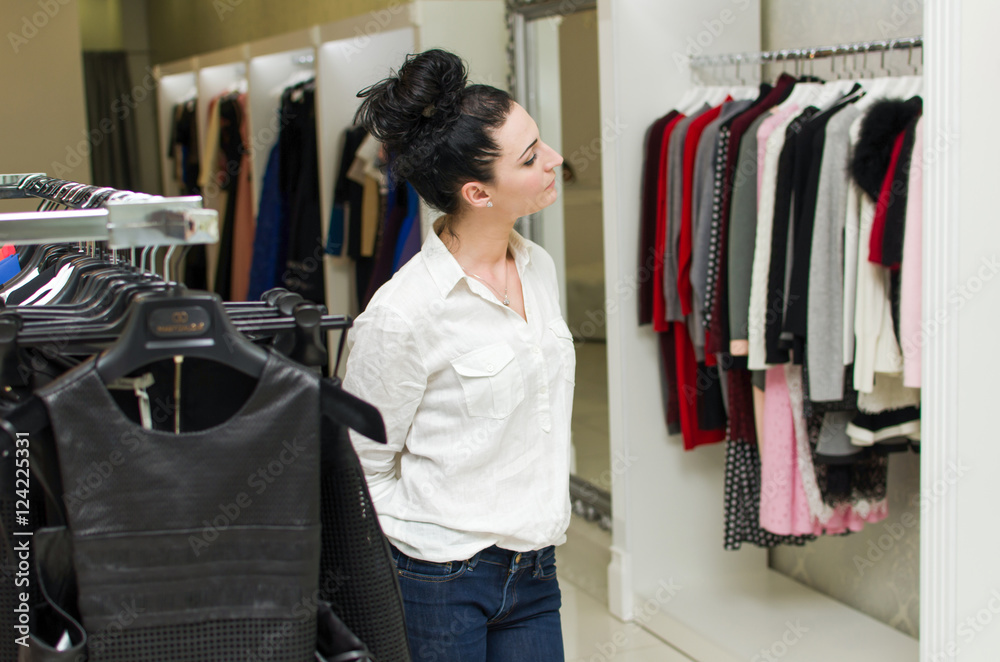 Woman in the clothing store Woman in the clothing store