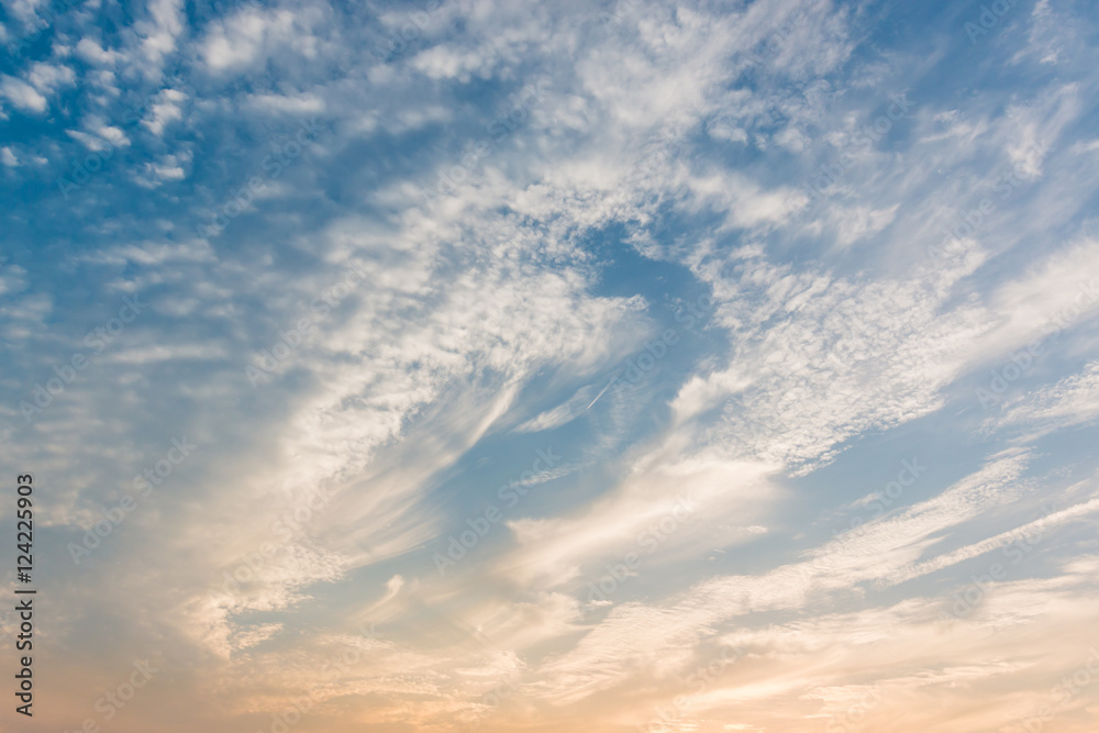 Sunset sky with white clouds and bright sky background.