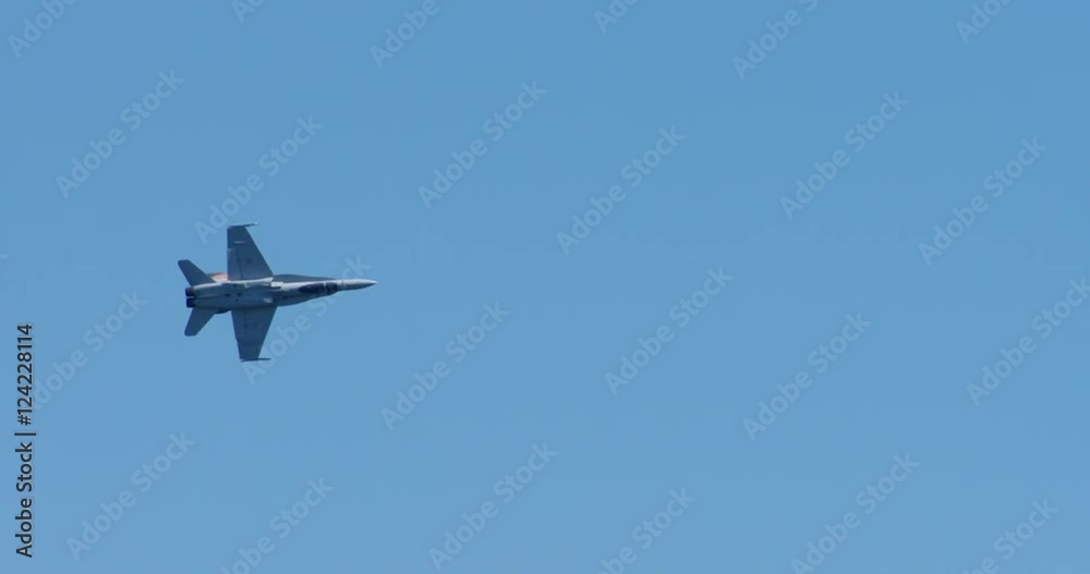 Tracking shot of military jet flying in sky Tracking shot of military jet flying in sky