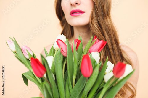 multicolored tulips and girl's lips