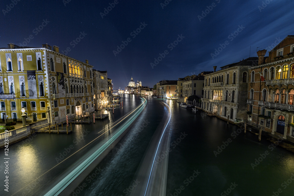 View of light streaks from boats on the Grand Canal near Accadem