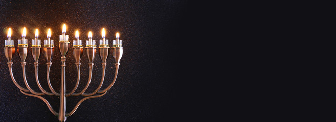 Low key Image of jewish holiday Hanukkah background