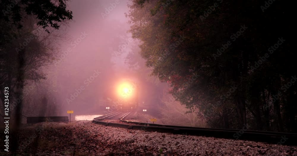Wide shot of vintage train moving on track