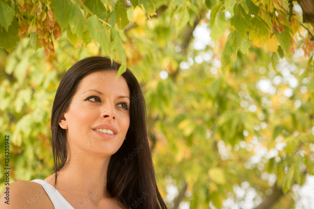 Beautiful brunette girl taking a walk in autumn Beautiful brunette girl taking a walk in autumn