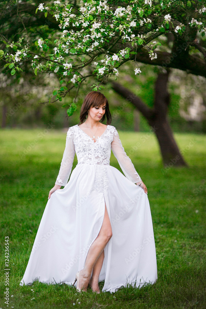 Gorgeous woman posing in a park