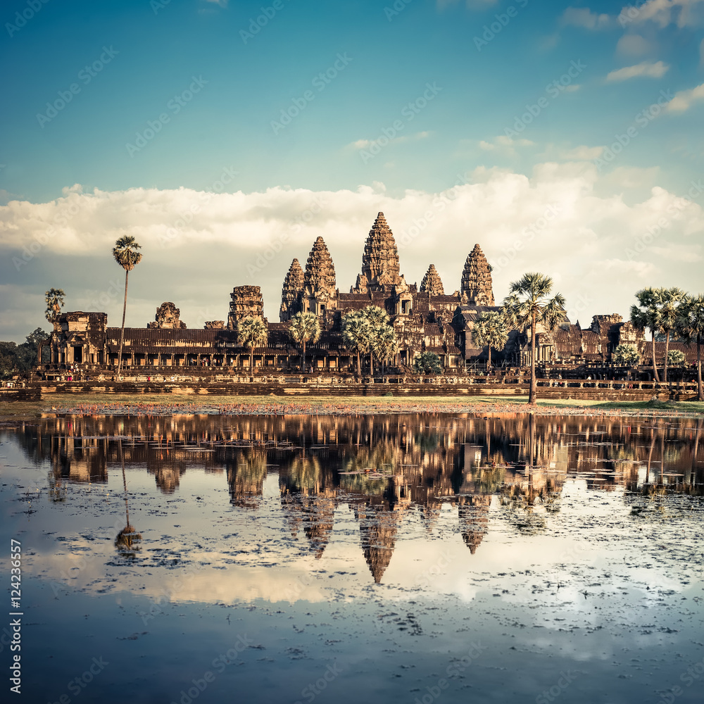 Fototapeta premium Ancient Khmer architecture. Panorama view of Angkor Wat temple under blue sky. Siem Reap, Cambodia