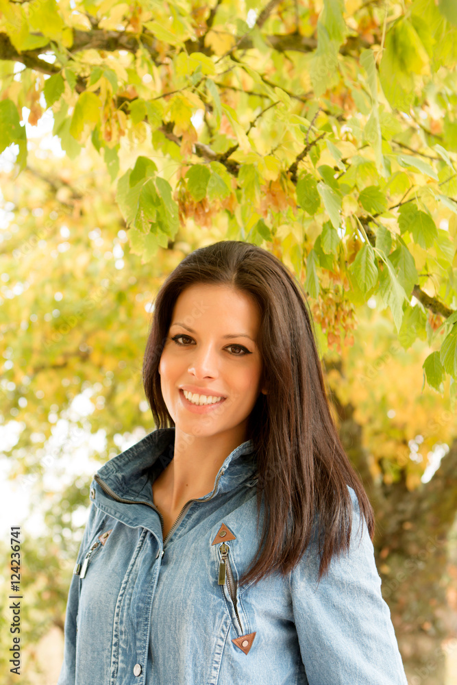 Beautiful brunette girl taking a walk in autumn Beautiful brunette girl taking a walk in autumn