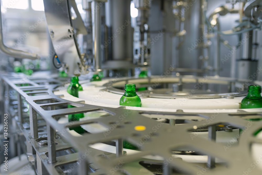 Water factory - Water bottling line for processing and bottling pure spring water into green glass small bottles. 