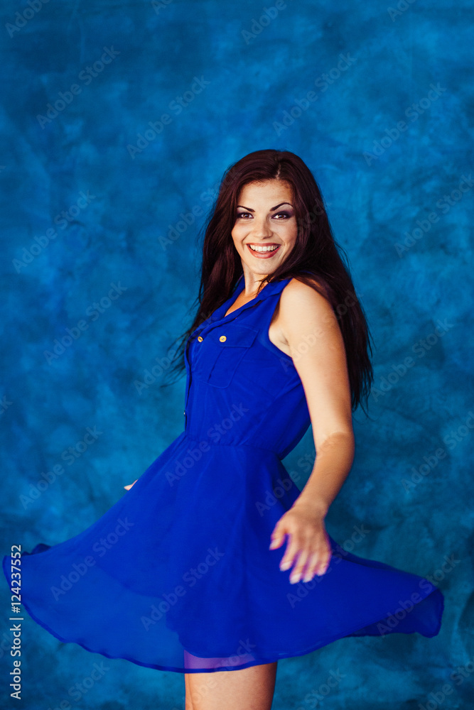 Sparkling smile of whirling brunette woman Sparkling smile of whirling brunette woman