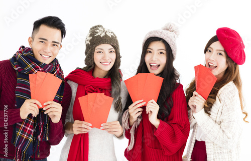 happy chinese new year. young group showing red envelope