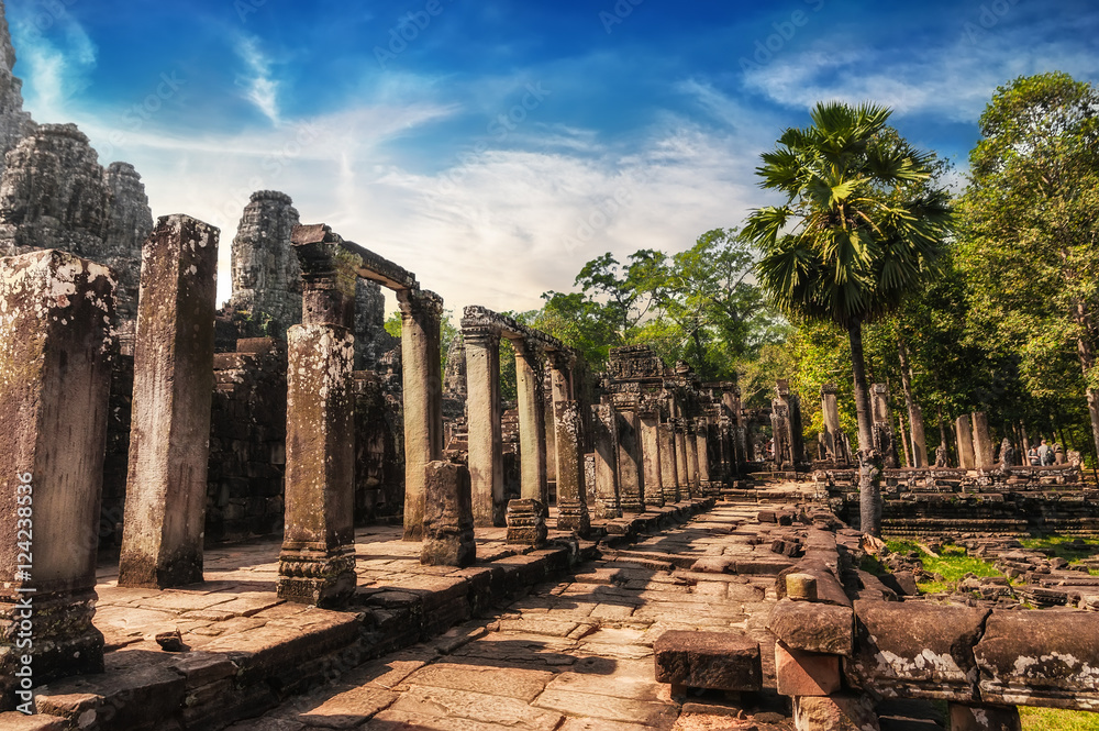 Ancient Khmer architecture. Amazing view of Bayon temple at sunset. Angkor Wat complex, Siem Reap, Cambodia travel destinations Ancient Khmer architecture. Amazing view of Bayon temple at sunset. Angkor Wat complex, Siem Reap, Cambodia travel destinations