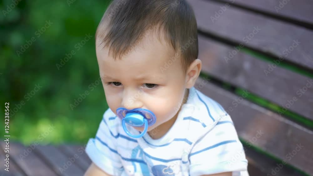 Beautiful child sucks a dummy. Beautiful child sucks a dummy.