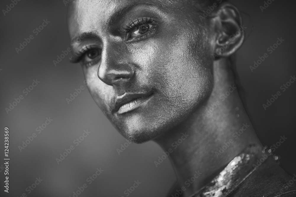 Black and white portrait of a model with shining face Black and white portrait of a model with shining face