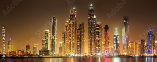 Photography Panoramic view of Dubai Marina bay with cloudy sky on sunset, Dubai, UAE