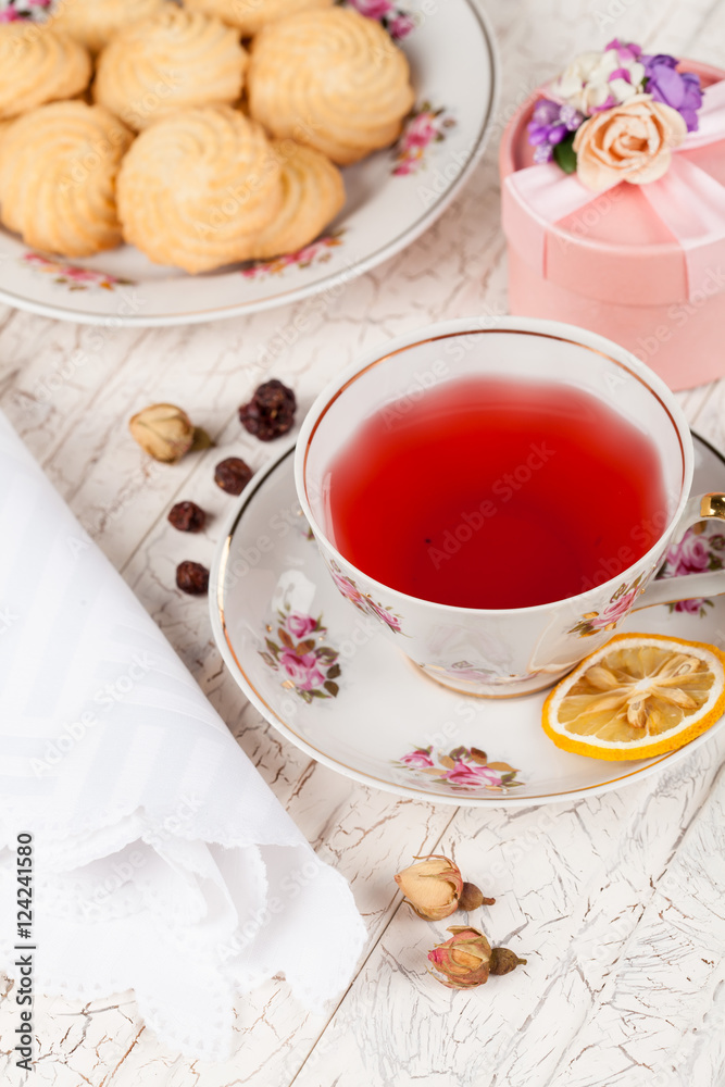 cup of red tea on serving table cup of red tea on serving table