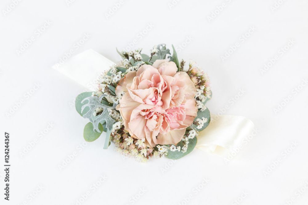Εκτύπωση καμβά Dusty pink carnation wrist corsage isolated on white background