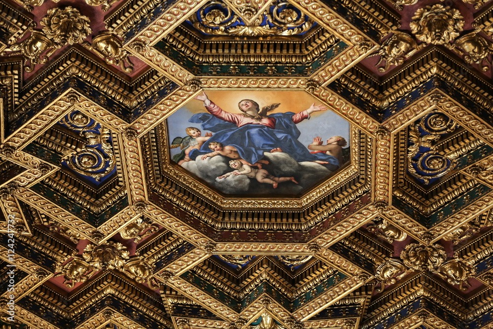  interiors and architectural details of basilica di Santa Maria in Trastevere in Rome, Italy. Octagonal ceiling painting Assumption of the Virgin by Domenichino